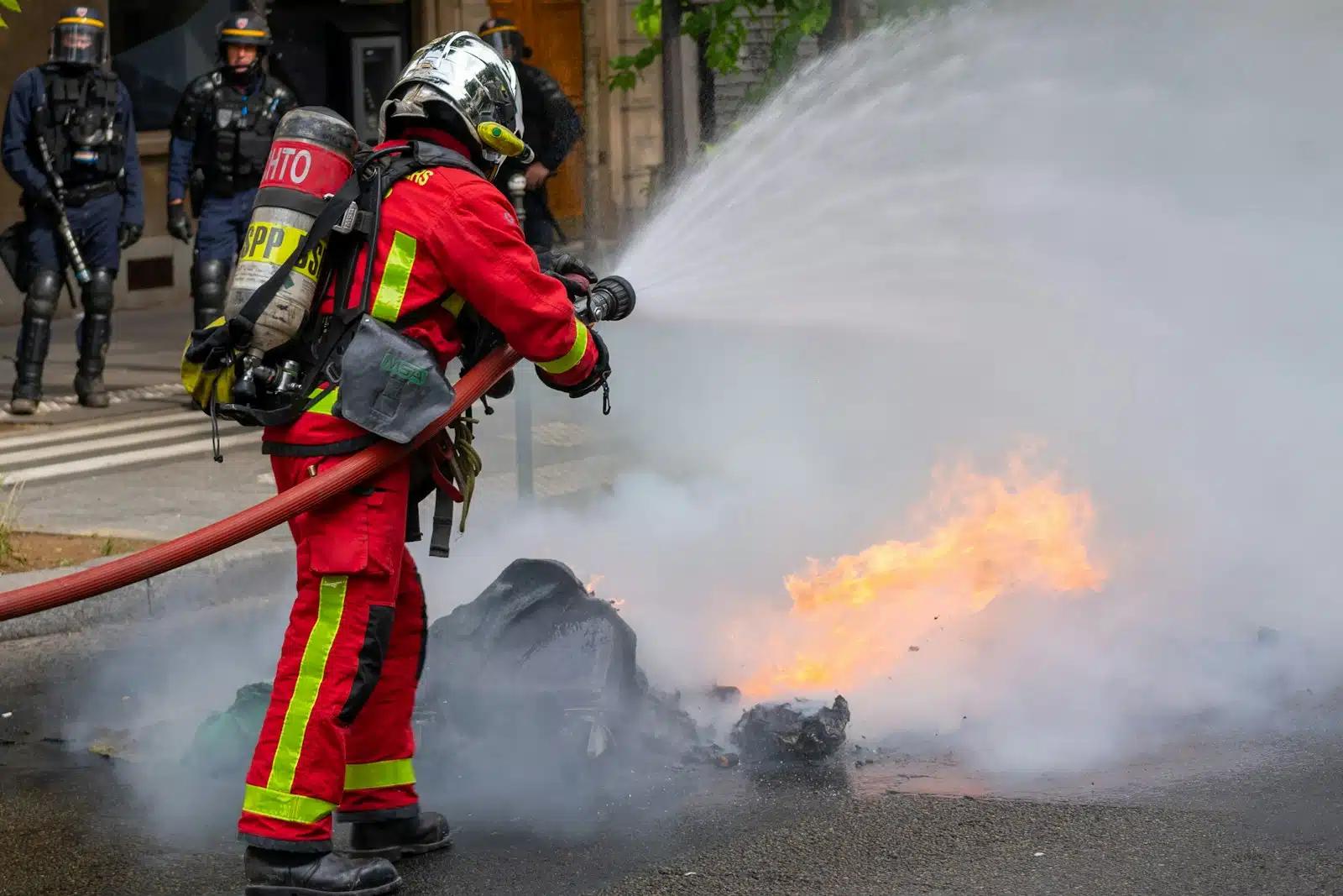 a firefighter putting out a fire